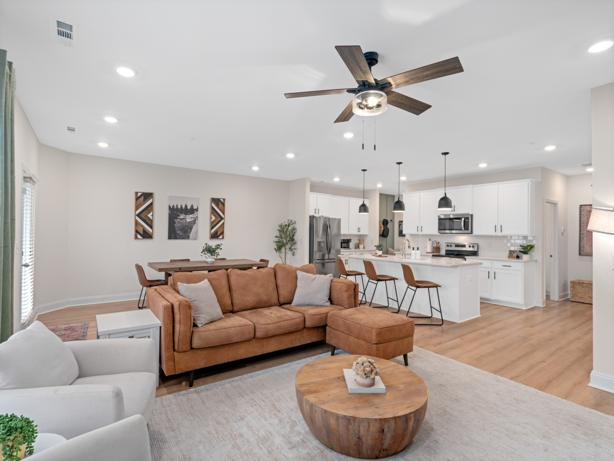 1043 June Wilde Ridge Spring Hill, TN 37174 - Photo 6 of 35 a living room with furniture and kitchen view