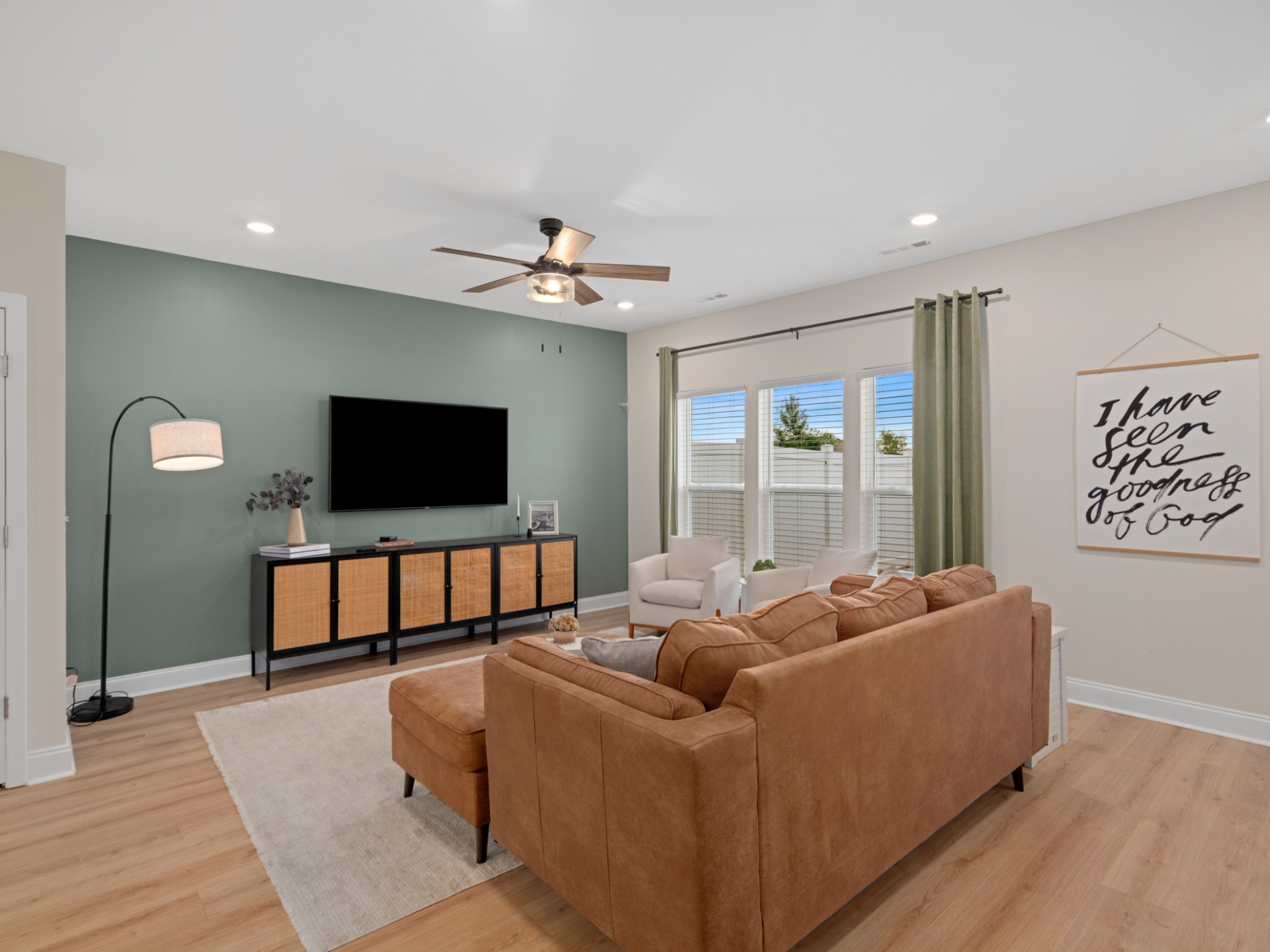 1043 June Wilde Ridge Spring Hill, TN 37174 - Photo 7 of 35 a living room with furniture and a flat screen tv