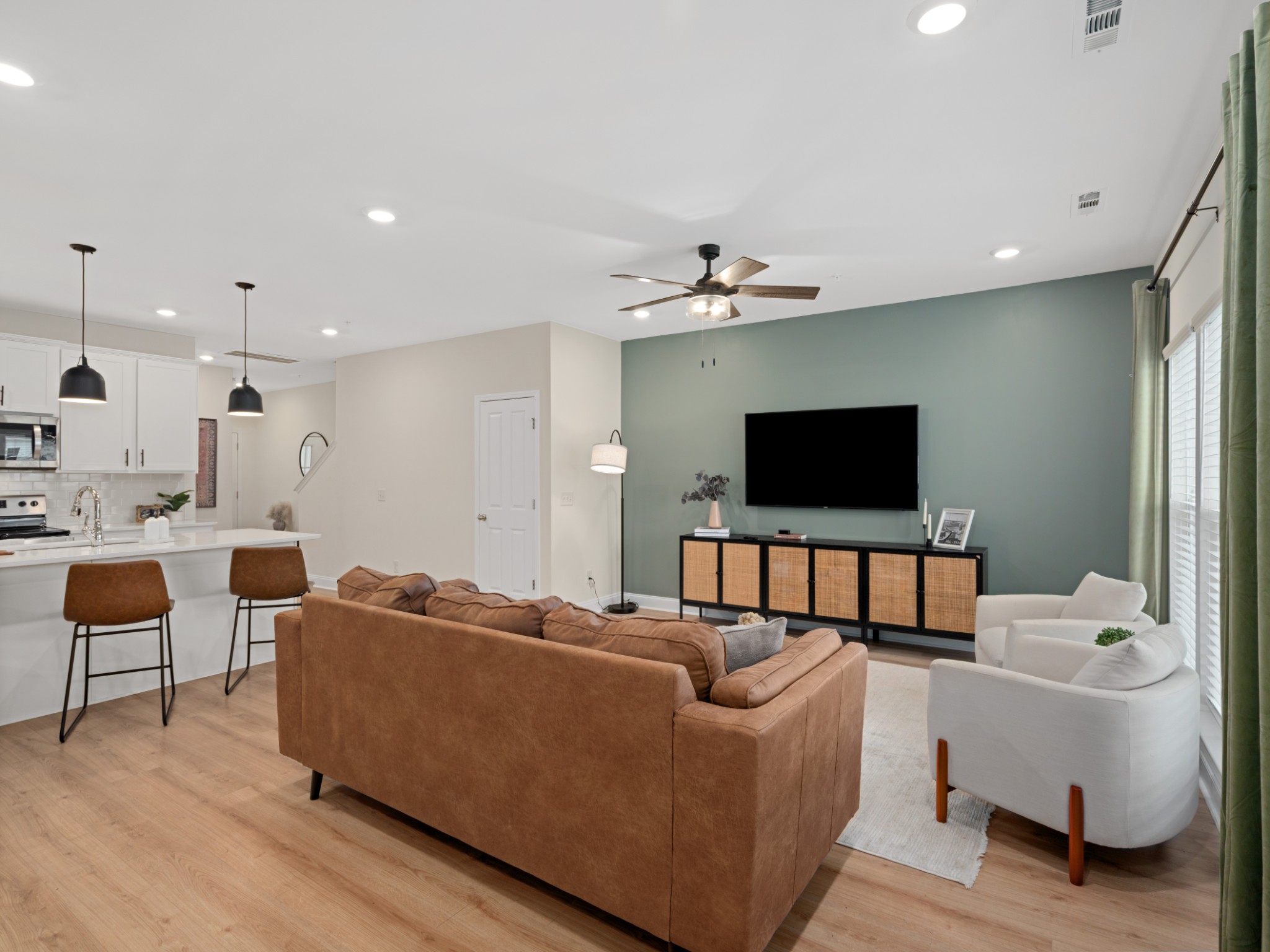 1043 June Wilde Ridge Spring Hill, TN 37174 - Photo 8 of 35 a living room with furniture and a flat screen tv