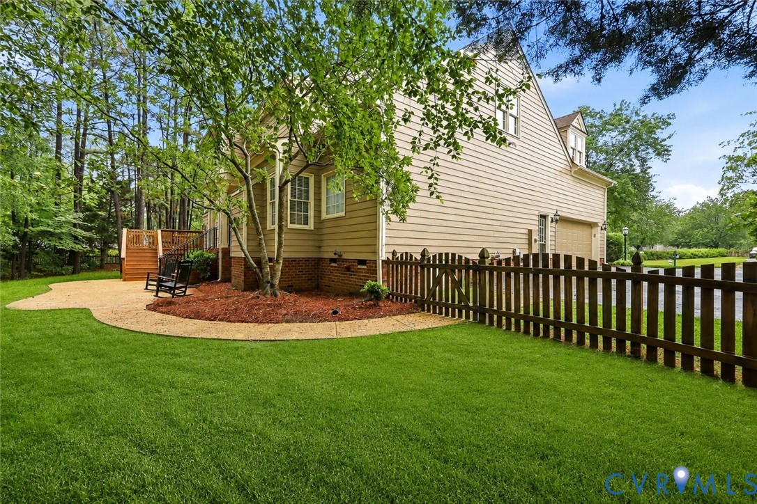 4701 Regal Oaks Road Glen Allen, VA 23059 - Photo 50 of 60 a view of a house with backyard and a tree