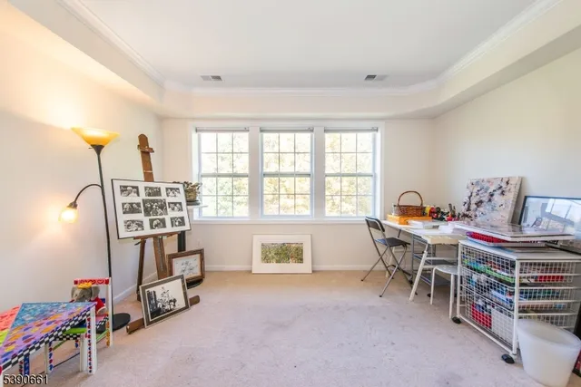 a workspace with furniture and a window