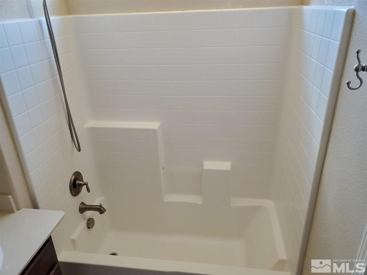 1655 Heavenly View Trail Reno, NV 89523 - Photo 24 of 39 a bathroom with a bathtub