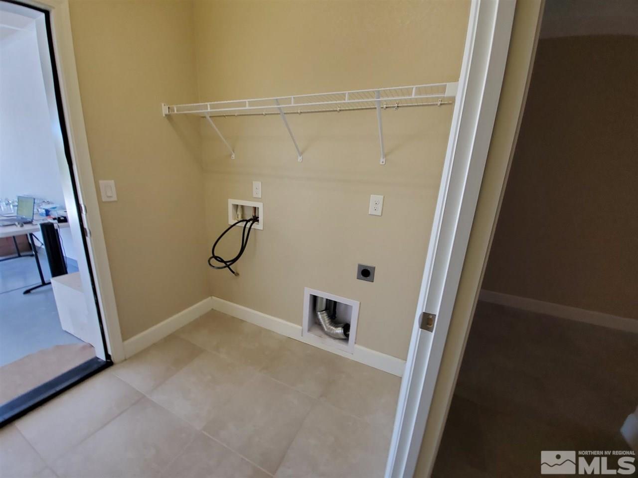 1655 Heavenly View Trail Reno, NV 89523 - Photo 27 of 39 a bathroom with a shower and a mirror