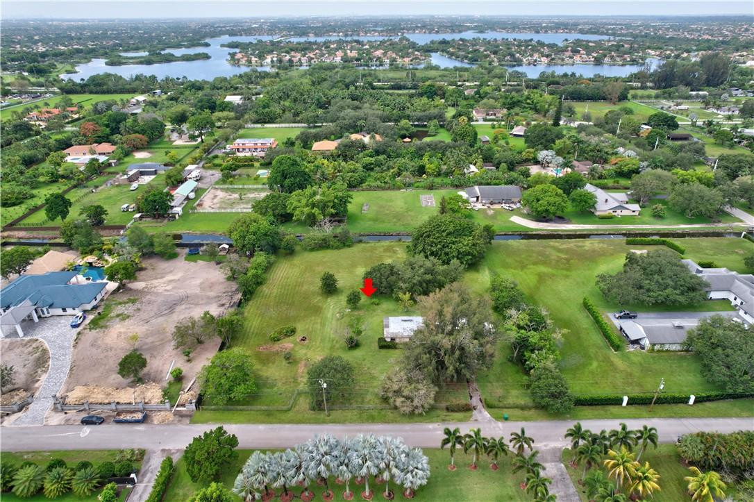 17700 Southwest 68th Court Southwest Ranches, FL 33331 - Photo 11 of 23 an aerial view of multiple house