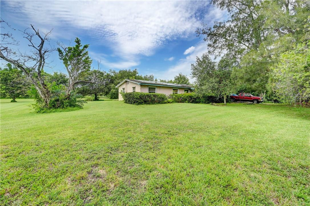 17700 Southwest 68th Court Southwest Ranches, FL 33331 - Photo 15 of 23 a view of a green field with lots of bushes