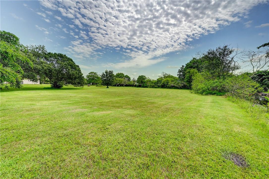17700 Southwest 68th Court Southwest Ranches, FL 33331 - Photo 18 of 23 a view of a field with an trees