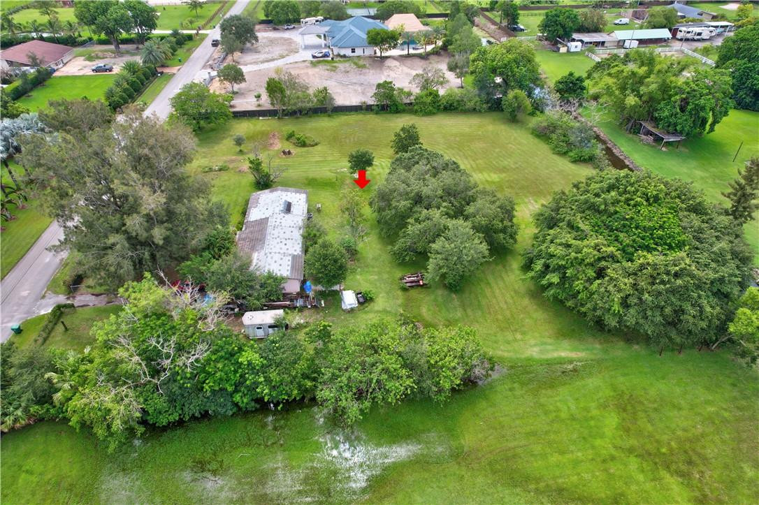 17700 Southwest 68th Court Southwest Ranches, FL 33331 - Photo 3 of 23 an aerial view of residential houses with outdoor space and trees all around