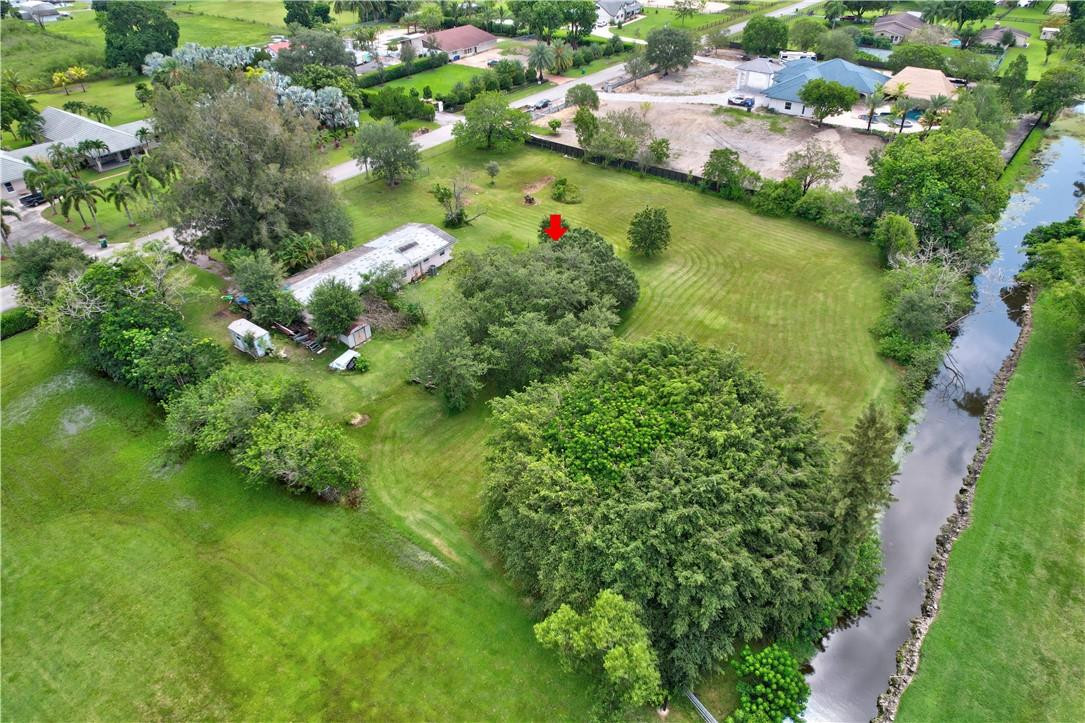 17700 Southwest 68th Court Southwest Ranches, FL 33331 - Photo 4 of 23 a view of a lake