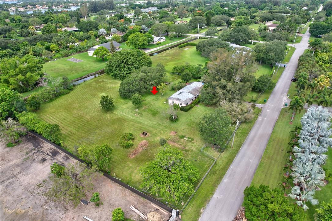 17700 Southwest 68th Court Southwest Ranches, FL 33331 - Photo 8 of 23 a view of a garden with a flower garden