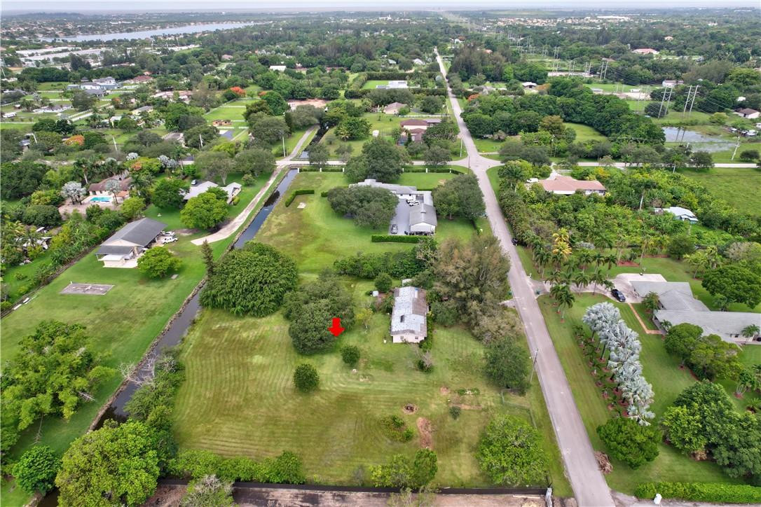 17700 Southwest 68th Court Southwest Ranches, FL 33331 - Photo 10 of 23 an aerial view of residential houses with outdoor space