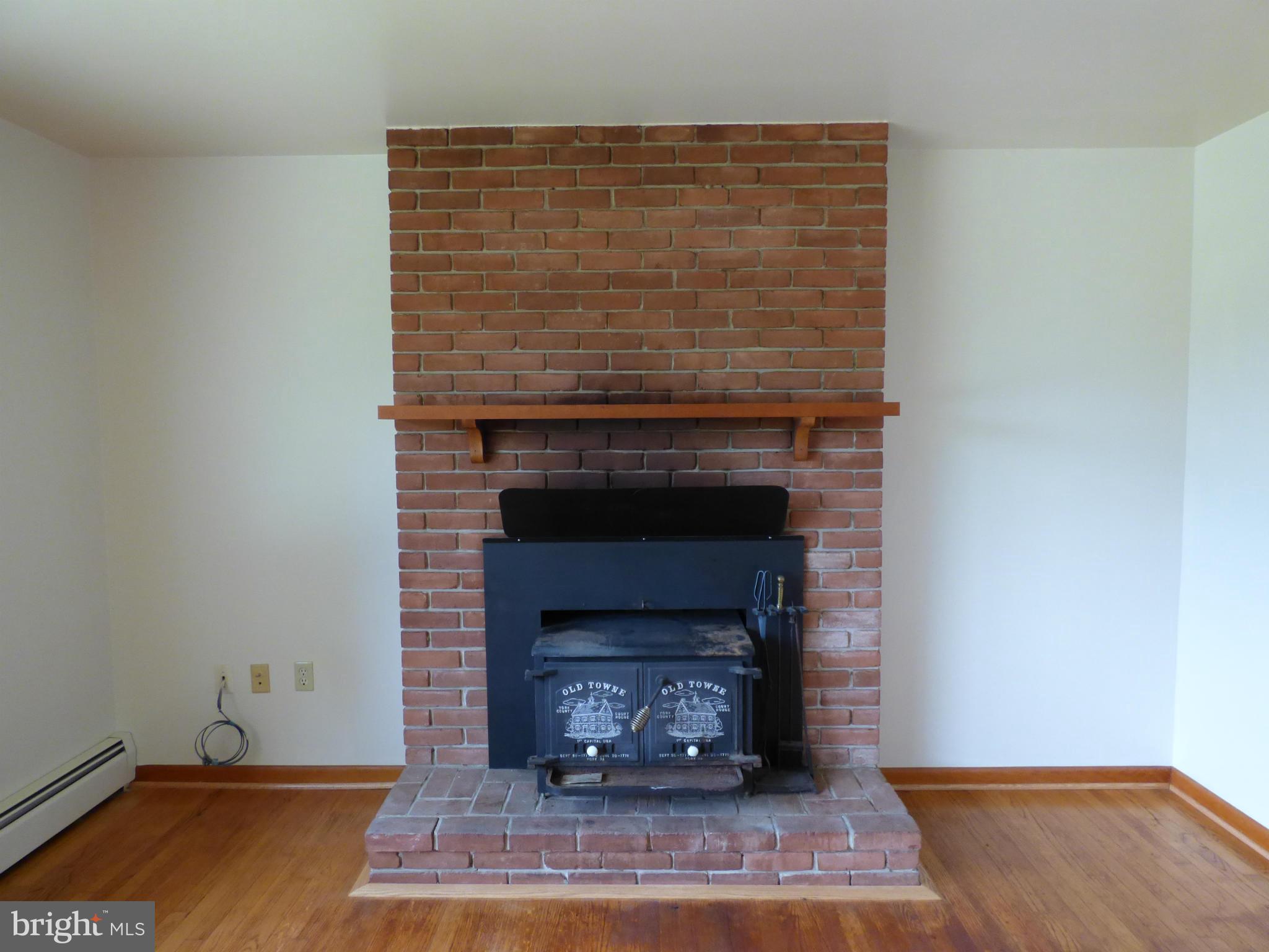 3418 Lineboro Road Manchester, MD 21102 - Photo 3 of 19 Fireplace with Woodstove Insert