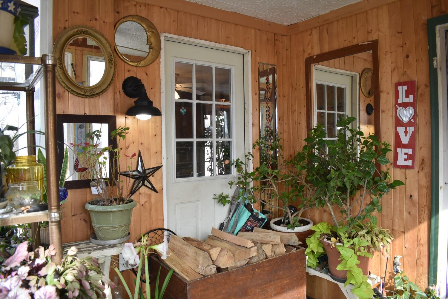 935 Garvey Road Winchester, OH 45697 - Photo 12 of 23 Bright and cozy sunroom porch