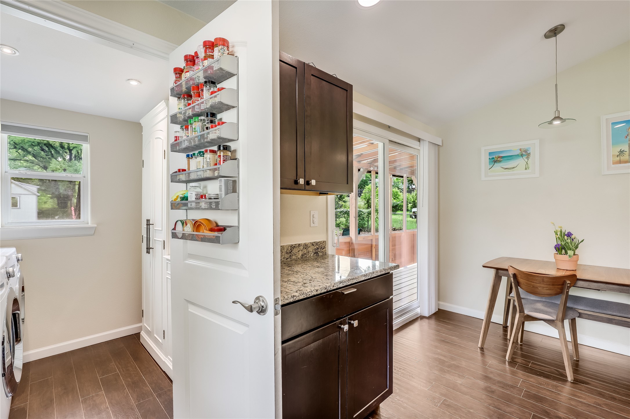 5112 Heflin Lane Austin, TX 78721 - Photo 15 of 38 In addition to the rich cabinetry, the adjacent pantry comes with extensive built-in pantry and kitchen storage.