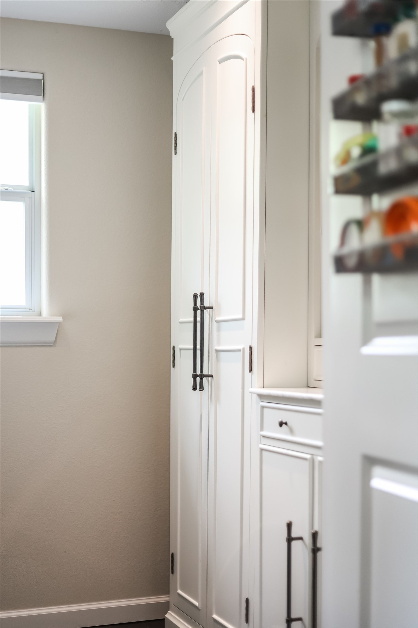 5112 Heflin Lane Austin, TX 78721 - Photo 27 of 38 The laundry room also doubles as the pantry with gorgeous custom built-ins that are sure to keep you well organized.