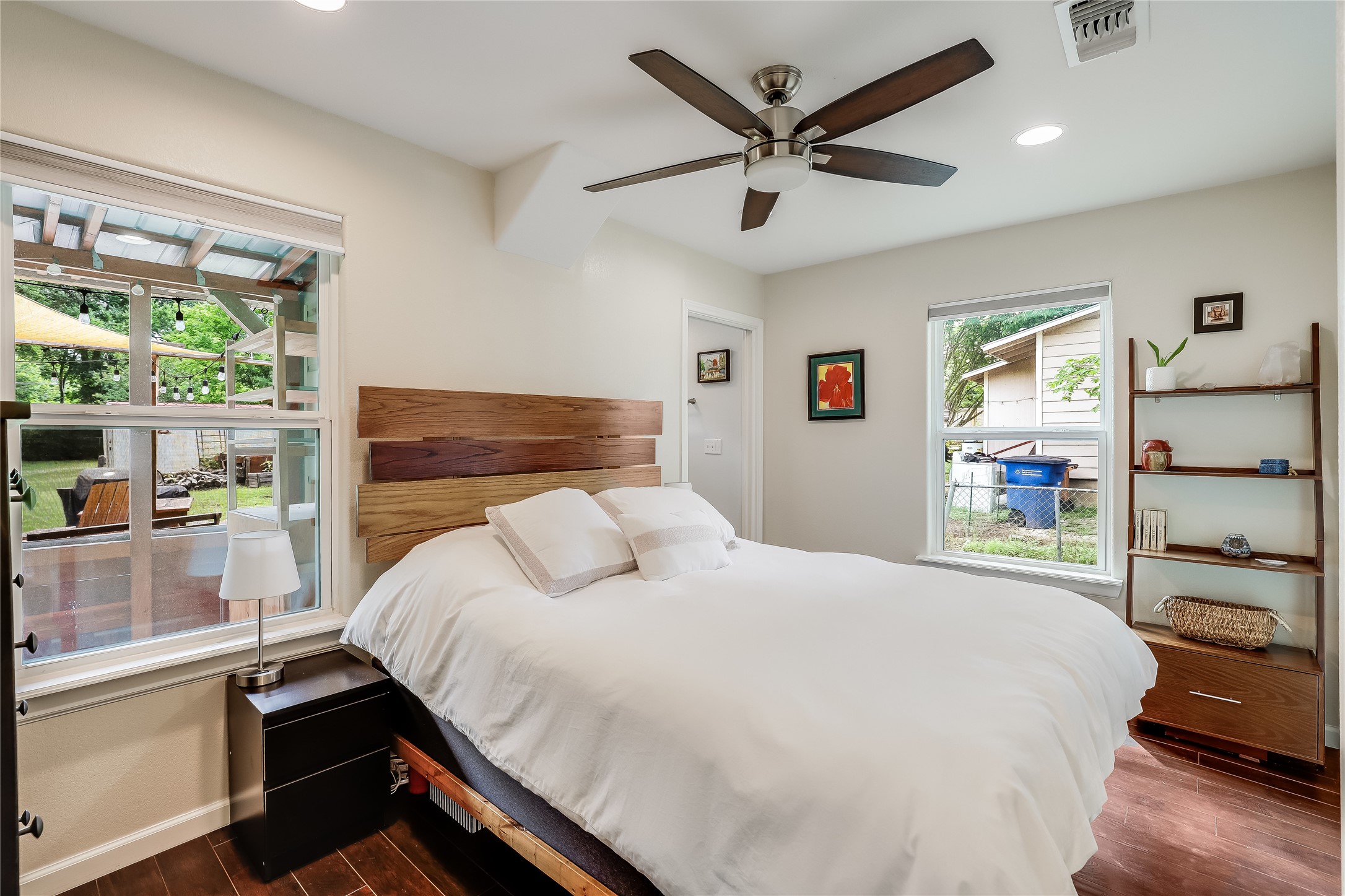 5112 Heflin Lane Austin, TX 78721 - Photo 4 of 38 Featuring three bedrooms including this primary suite with its own updated bathroom, plus a full guest bath with tasteful updates.