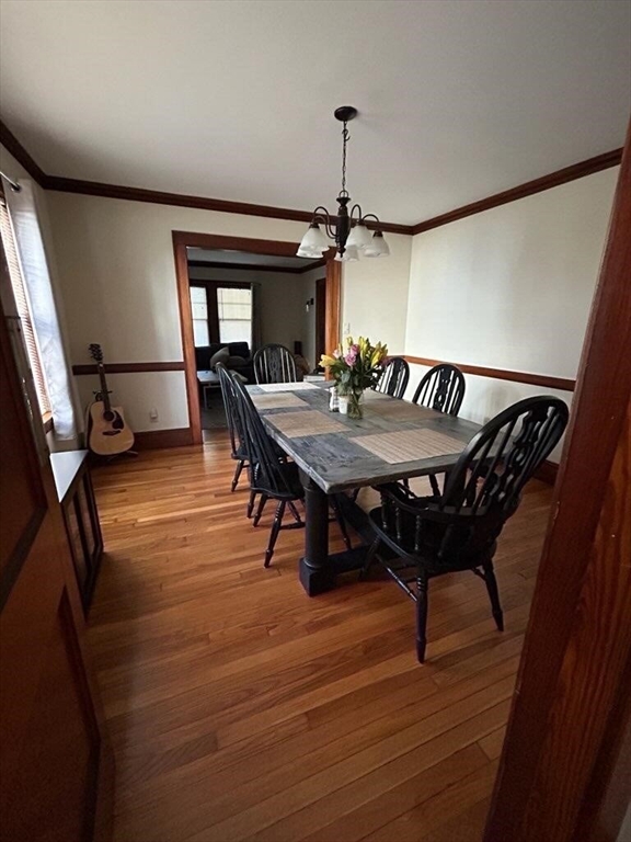 207 South Street, Unit 1 Waltham, MA 02453 - Photo 3 of 8 a view of a dining room with furniture and window