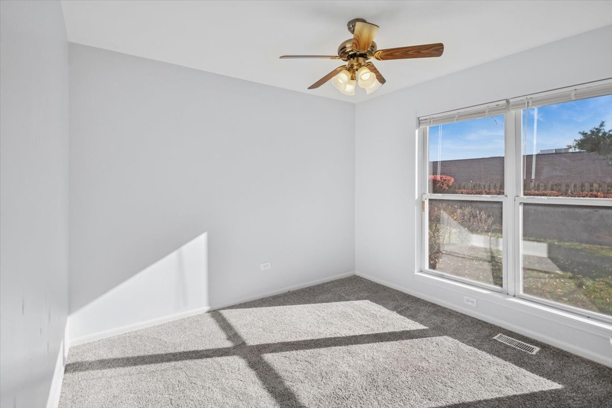 120 Cathy Lane, Unit 120 Mount Prospect, IL 60056 - Photo 12 of 20 a view of wooden floor in a room