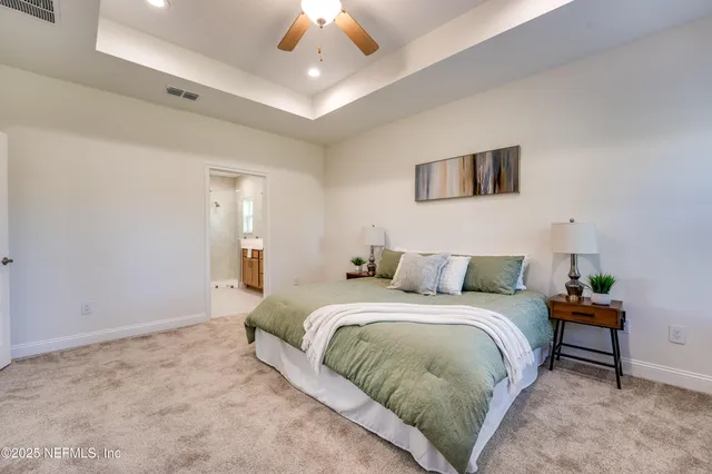 a view of a bathroom from a hallway