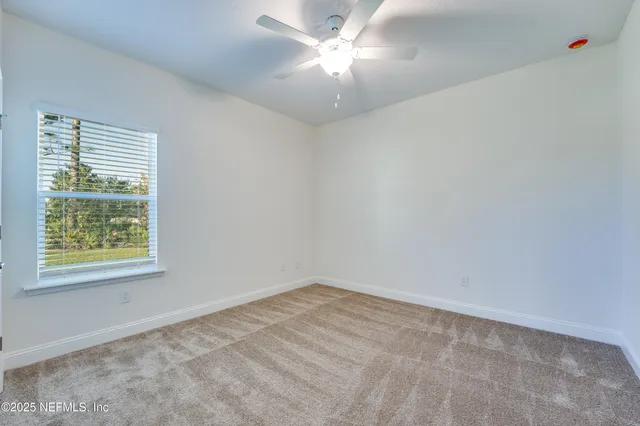 a view of house with a yard