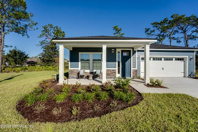 a kitchen with a dining table chairs and white appliances