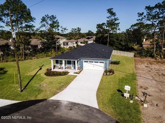 a view of a park with a slide