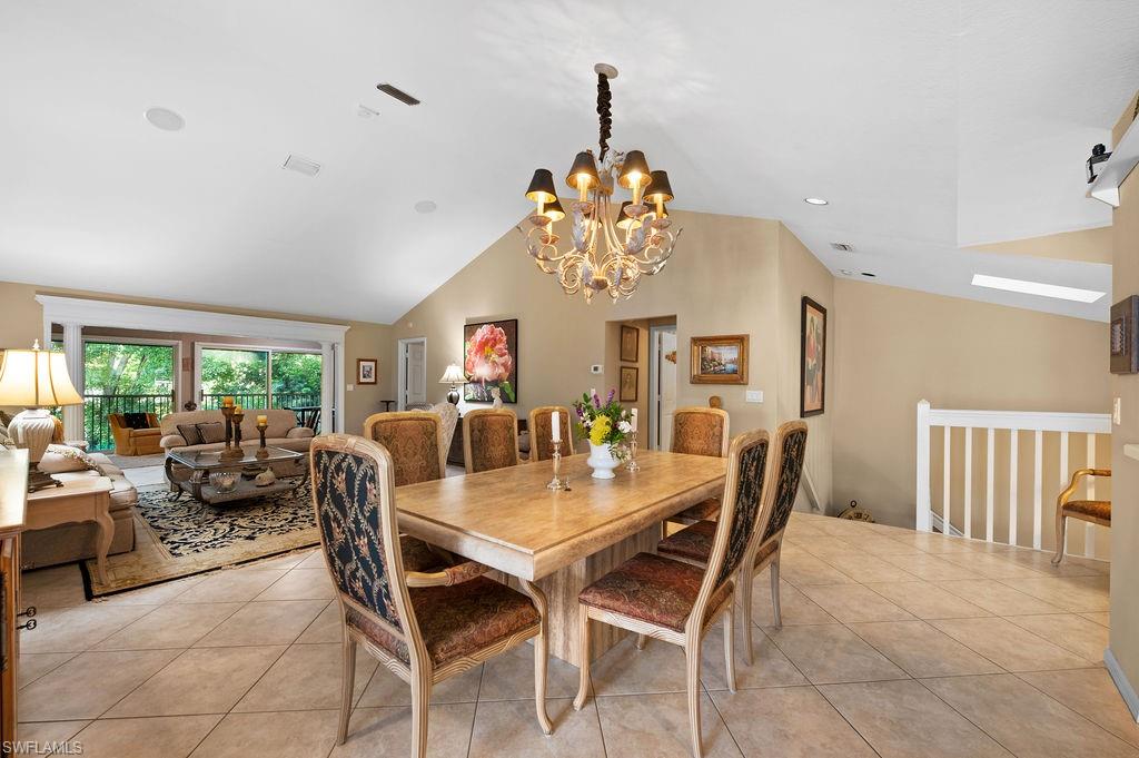 205 Via Perignon, Unit 23 Naples, FL 34119 - Photo 4 of 37 a view of a dining room with furniture window and outside view