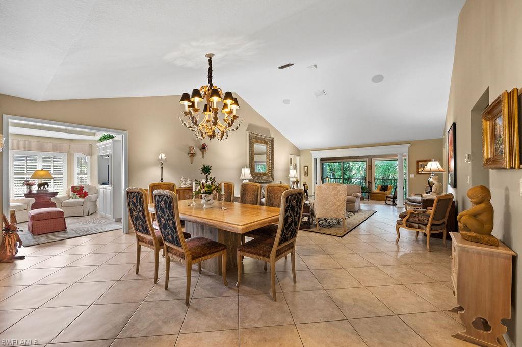205 Via Perignon, Unit 23 Naples, FL 34119 - Photo 5 of 37 a view of a dining room with furniture window and outside view