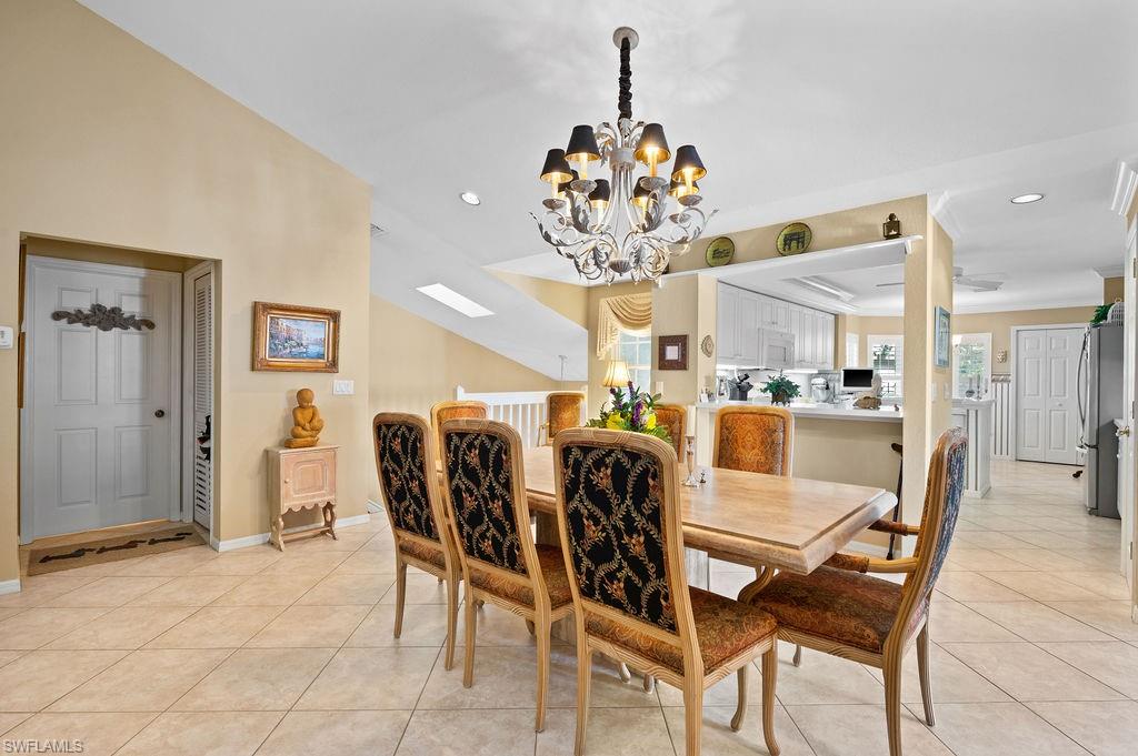 205 Via Perignon, Unit 23 Naples, FL 34119 - Photo 6 of 37 a view of a dining room with furniture