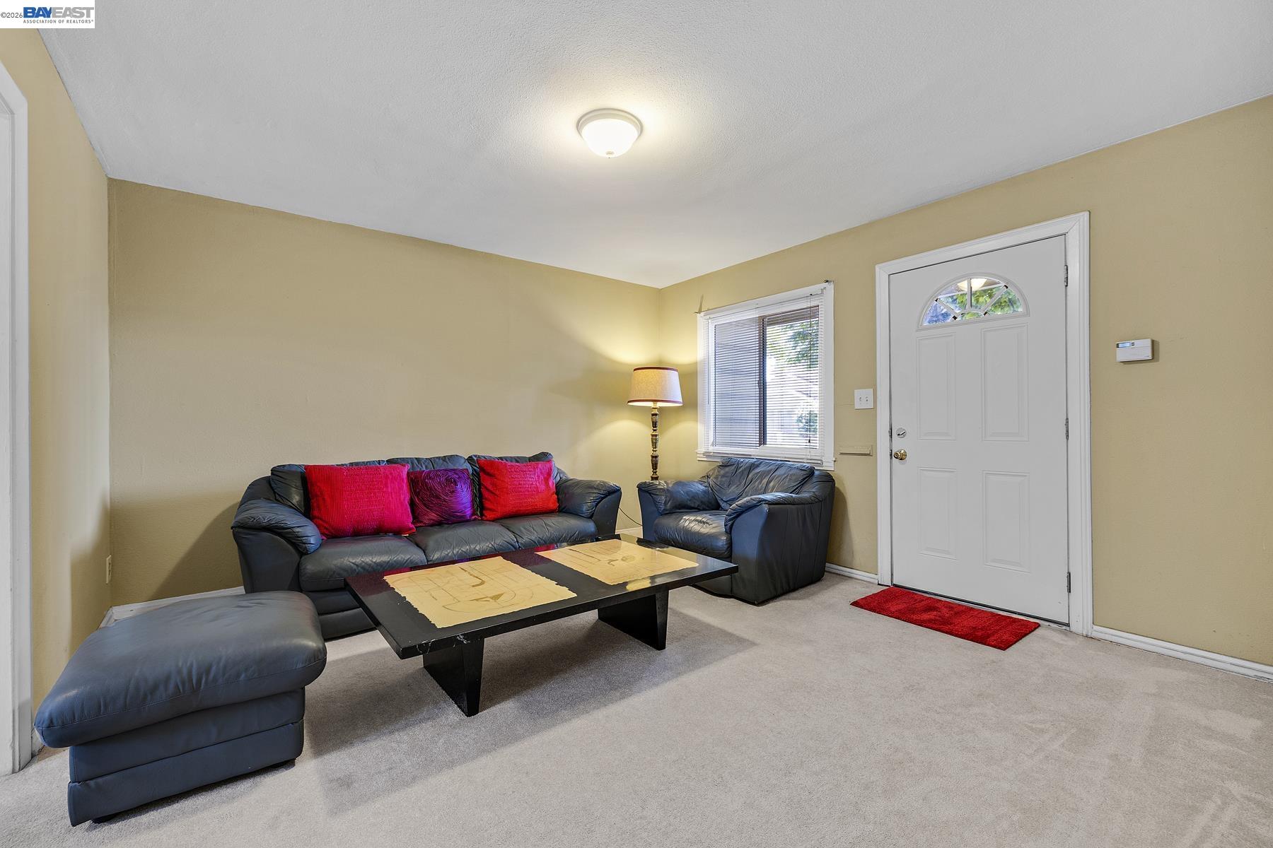 462 Hampton Road Hayward, CA 94541 - Photo 12 of 38 a living room with furniture and a wooden floor