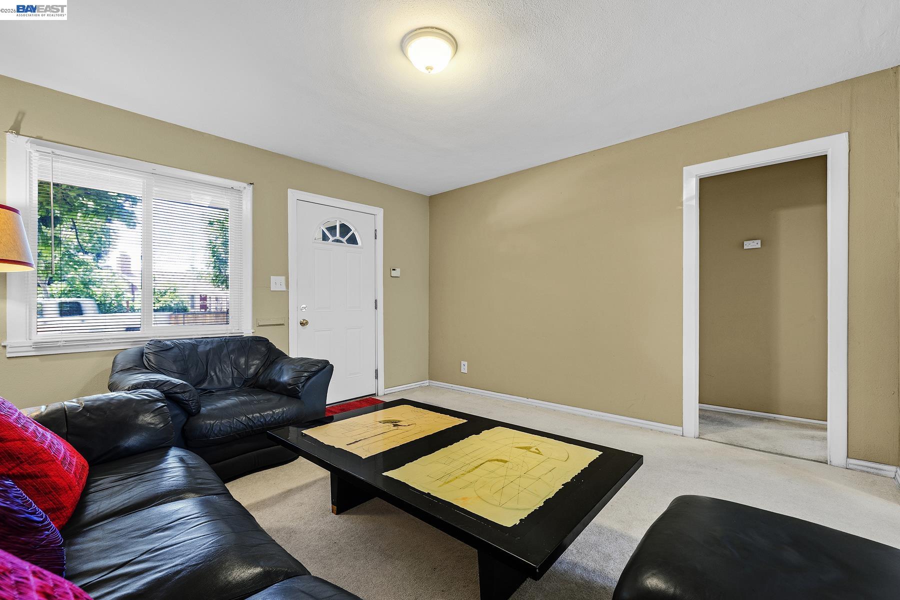 462 Hampton Road Hayward, CA 94541 - Photo 13 of 38 a living room with furniture and a window