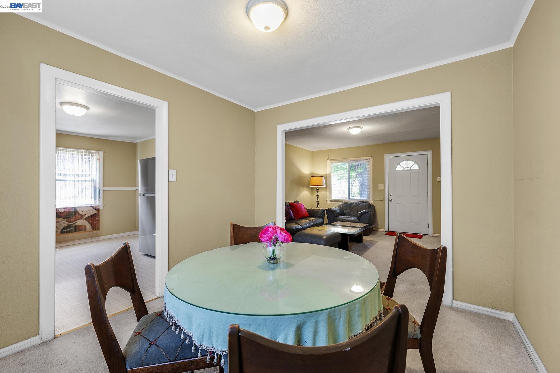 462 Hampton Road Hayward, CA 94541 - Photo 15 of 38 a dining room with a table and chairs