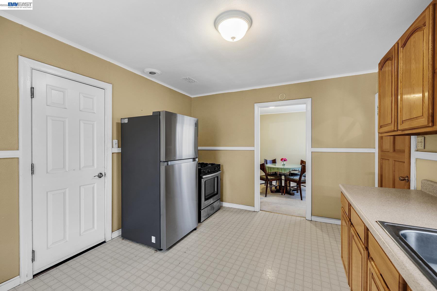 462 Hampton Road Hayward, CA 94541 - Photo 20 of 38 a view of kitchen with furniture and refrigerator