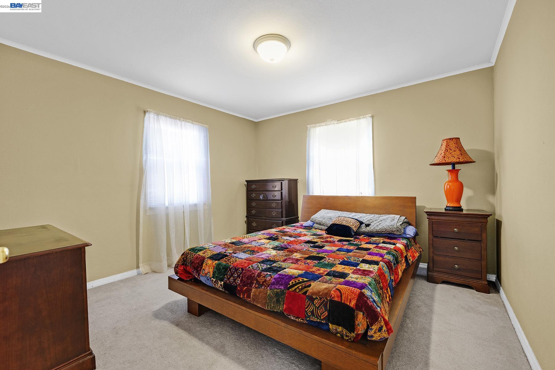 462 Hampton Road Hayward, CA 94541 - Photo 23 of 38 a bedroom with a bed and window