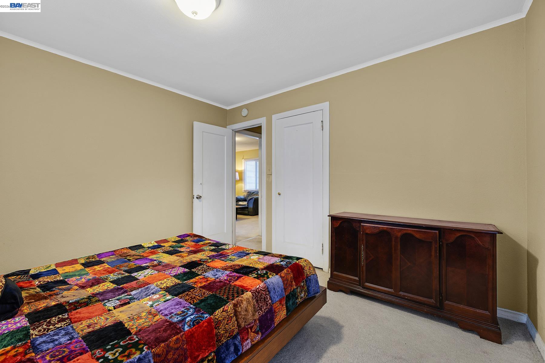 462 Hampton Road Hayward, CA 94541 - Photo 24 of 38 a bedroom with a bed and wooden floor