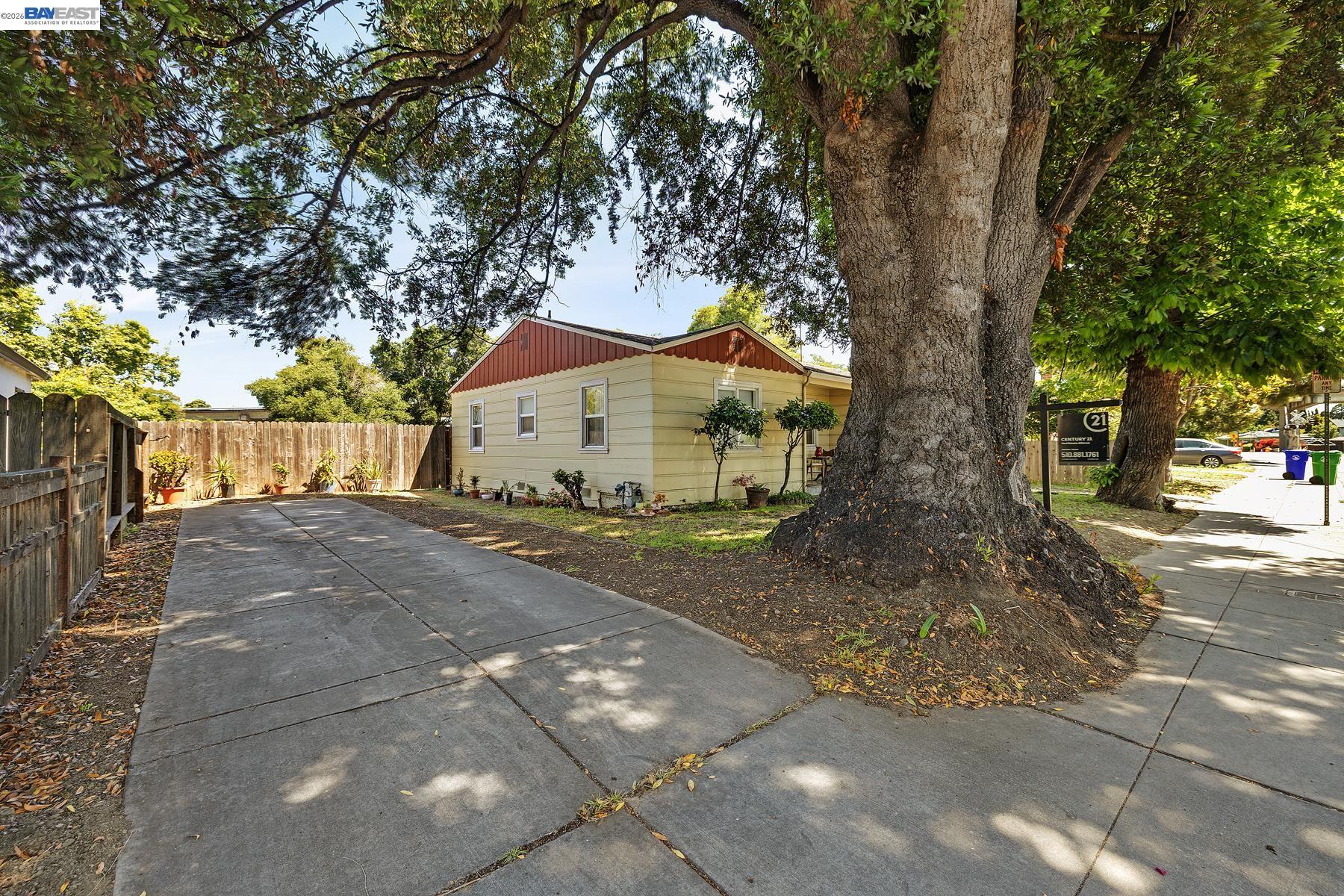 462 Hampton Road Hayward, CA 94541 - Photo 5 of 38 a view of a house with a tree
