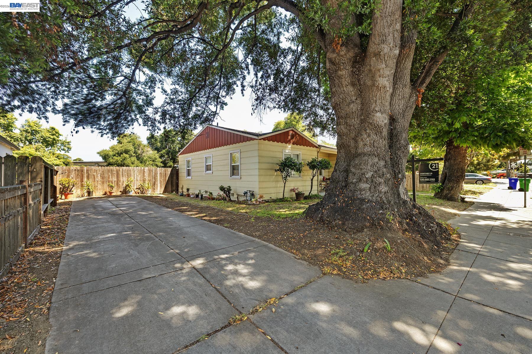 462 Hampton Road Hayward, CA 94541 - Photo 6 of 38 a view of a house with a tree
