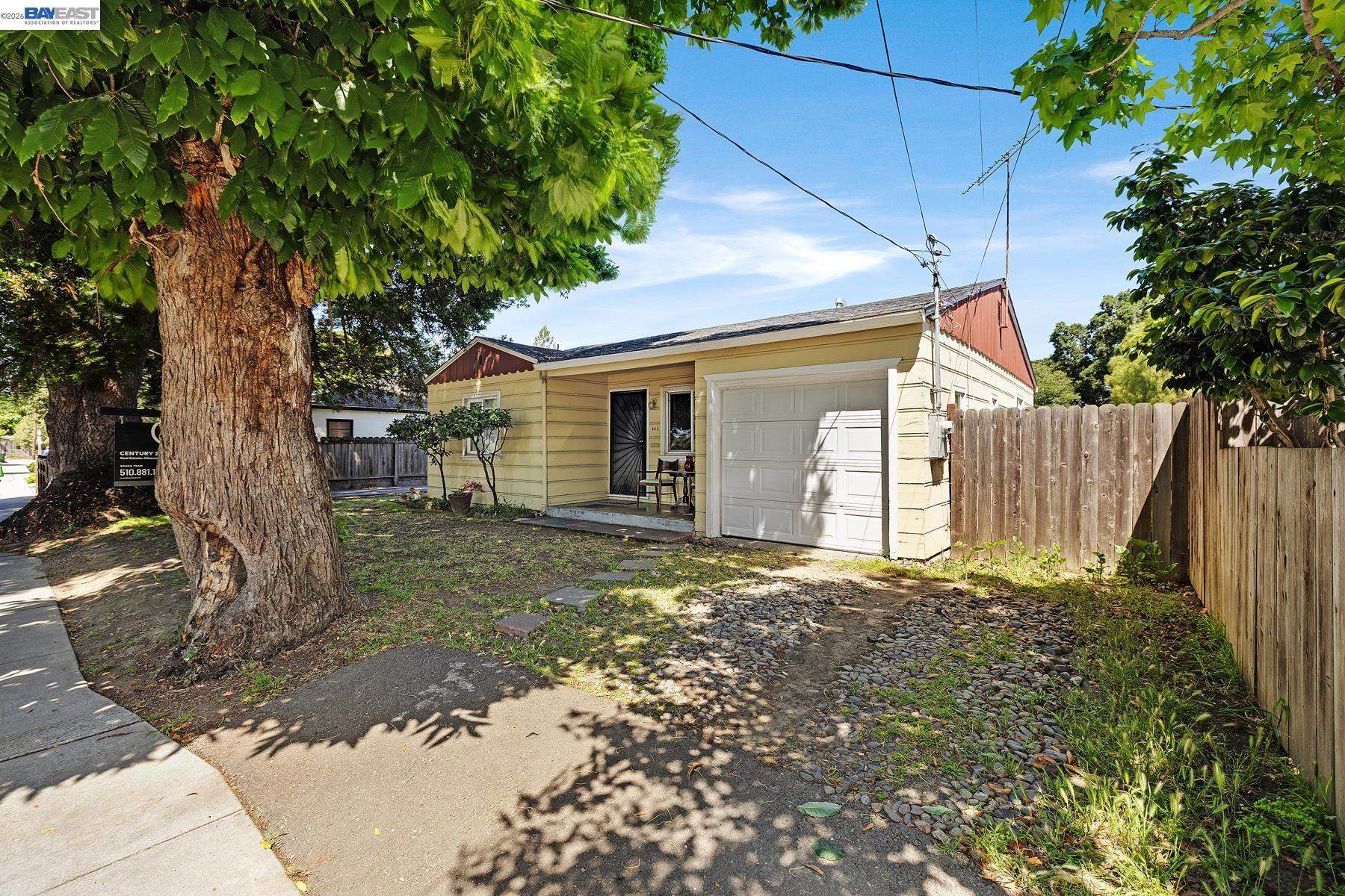 462 Hampton Road Hayward, CA 94541 - Photo 7 of 38 a house with trees in front of it