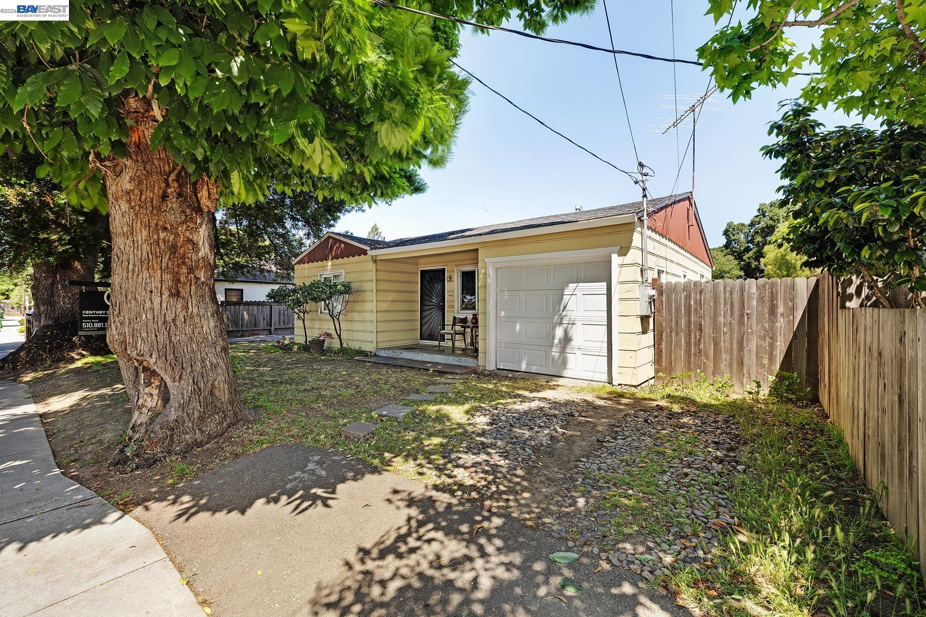 462 Hampton Road Hayward, CA 94541 - Photo 8 of 38 a yard with a large tree in front of it