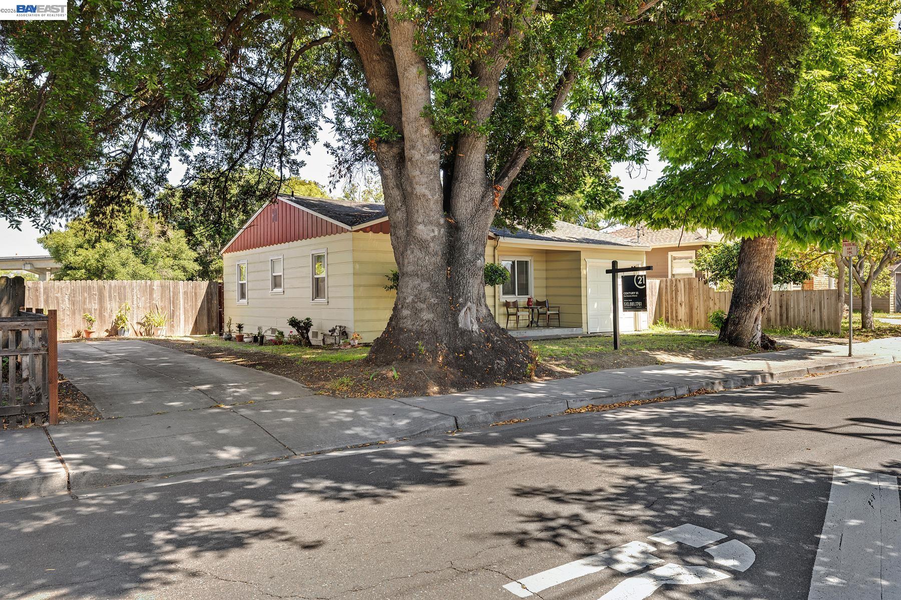 462 Hampton Road Hayward, CA 94541 - Photo 9 of 38 a view of a house with a tree in front