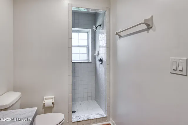 a bathroom with a toilet