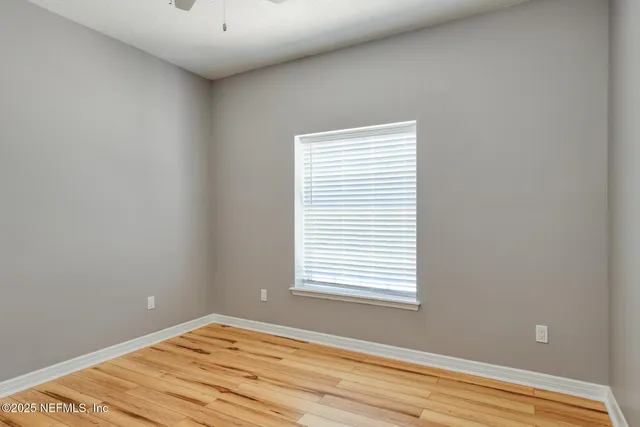 a view of a room with a window