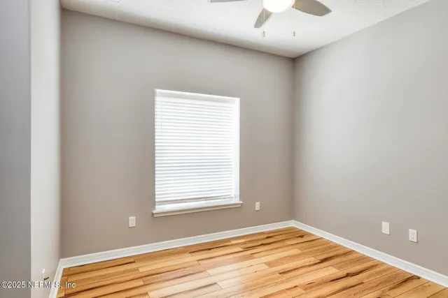 a view of a room with windows