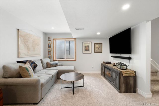 a living room with furniture and a couch