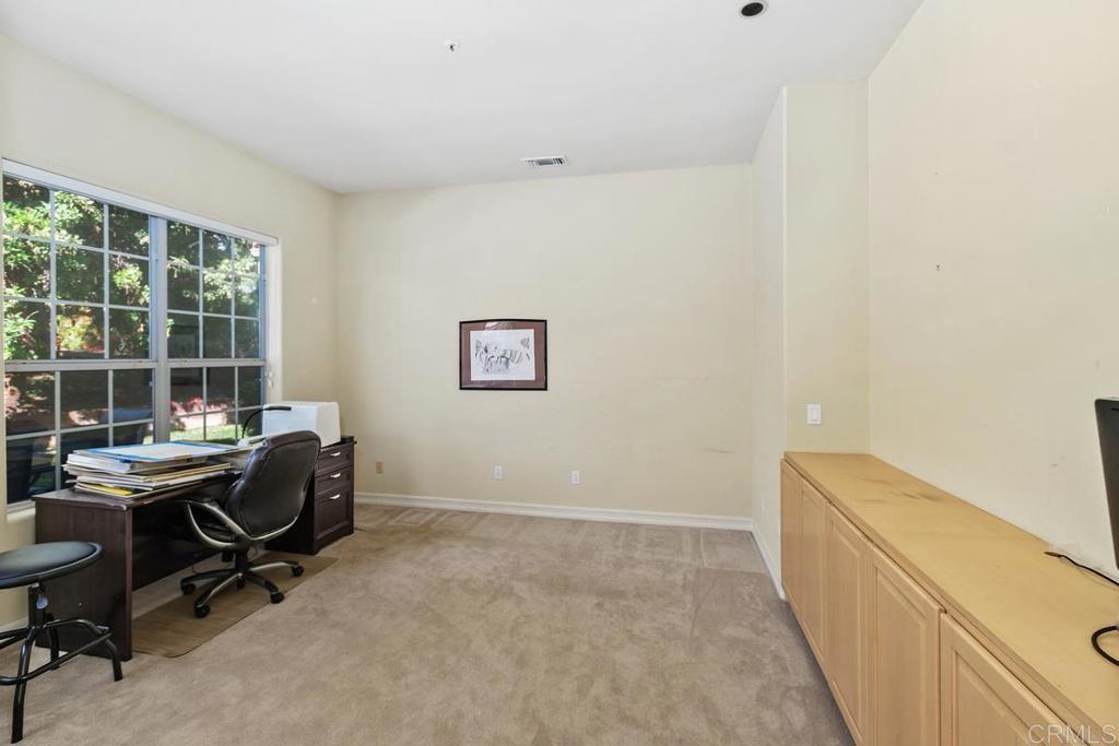 3068 Southwind Lane Vista, CA 92084 - Photo 28 of 44 a view of a workspace with furniture
