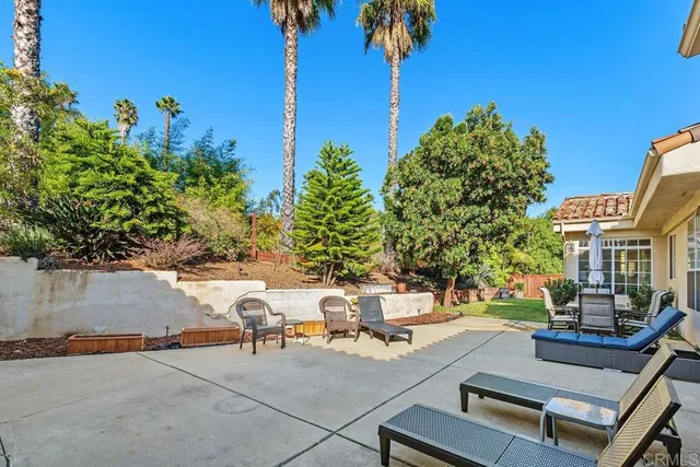 a view of a patio with swimming pool