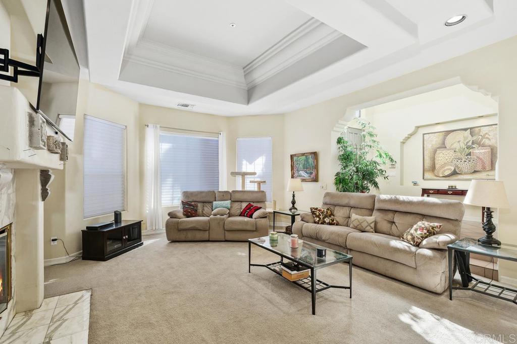 3068 Southwind Lane Vista, CA 92084 - Photo 4 of 44 a living room with furniture and a large window