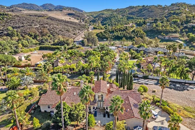 an aerial view of residential building and parking space
