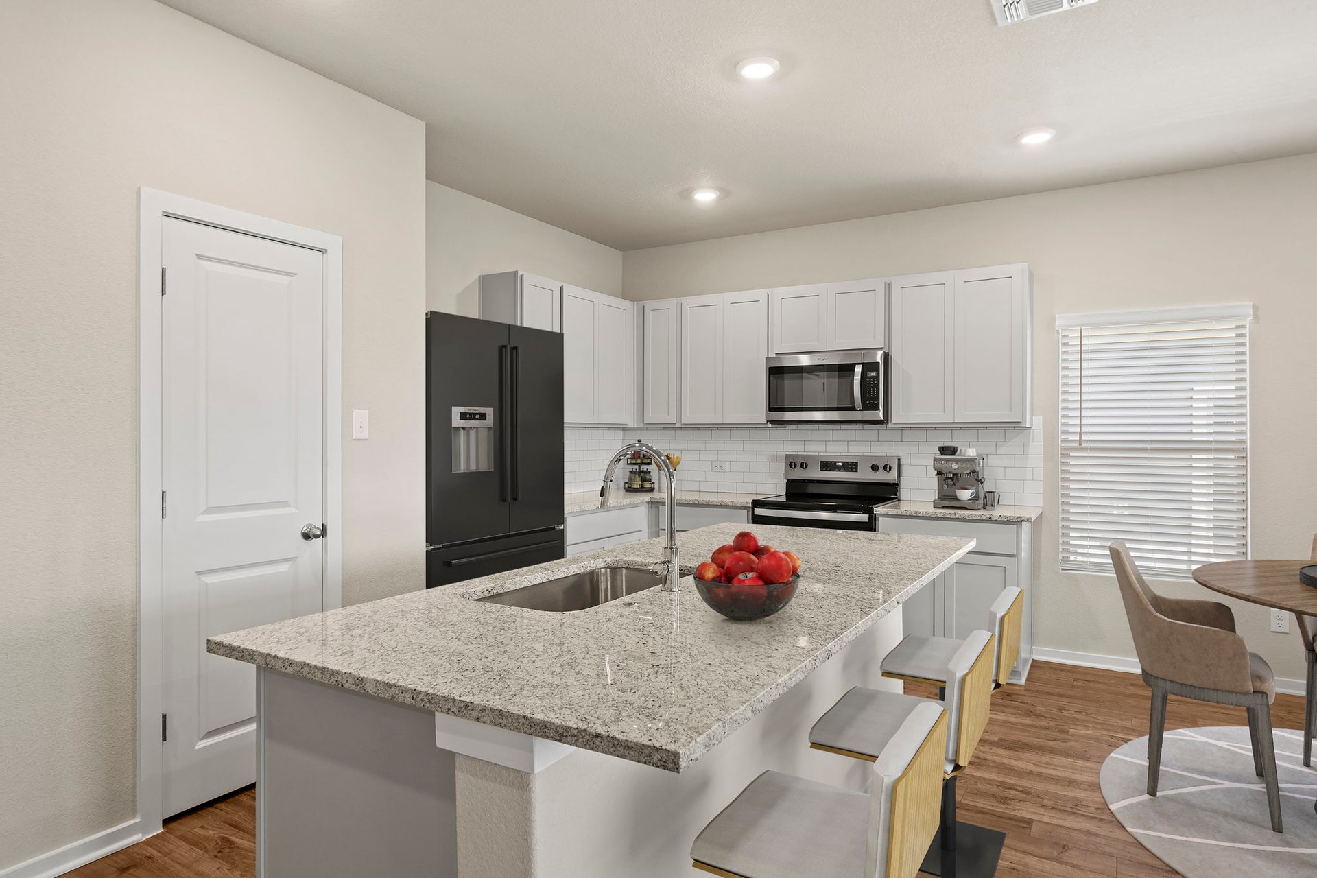172 Wind Hill Jarrell, TX 76537 - Photo 5 of 30 Light & Bright Kitchen - Virtually Staged