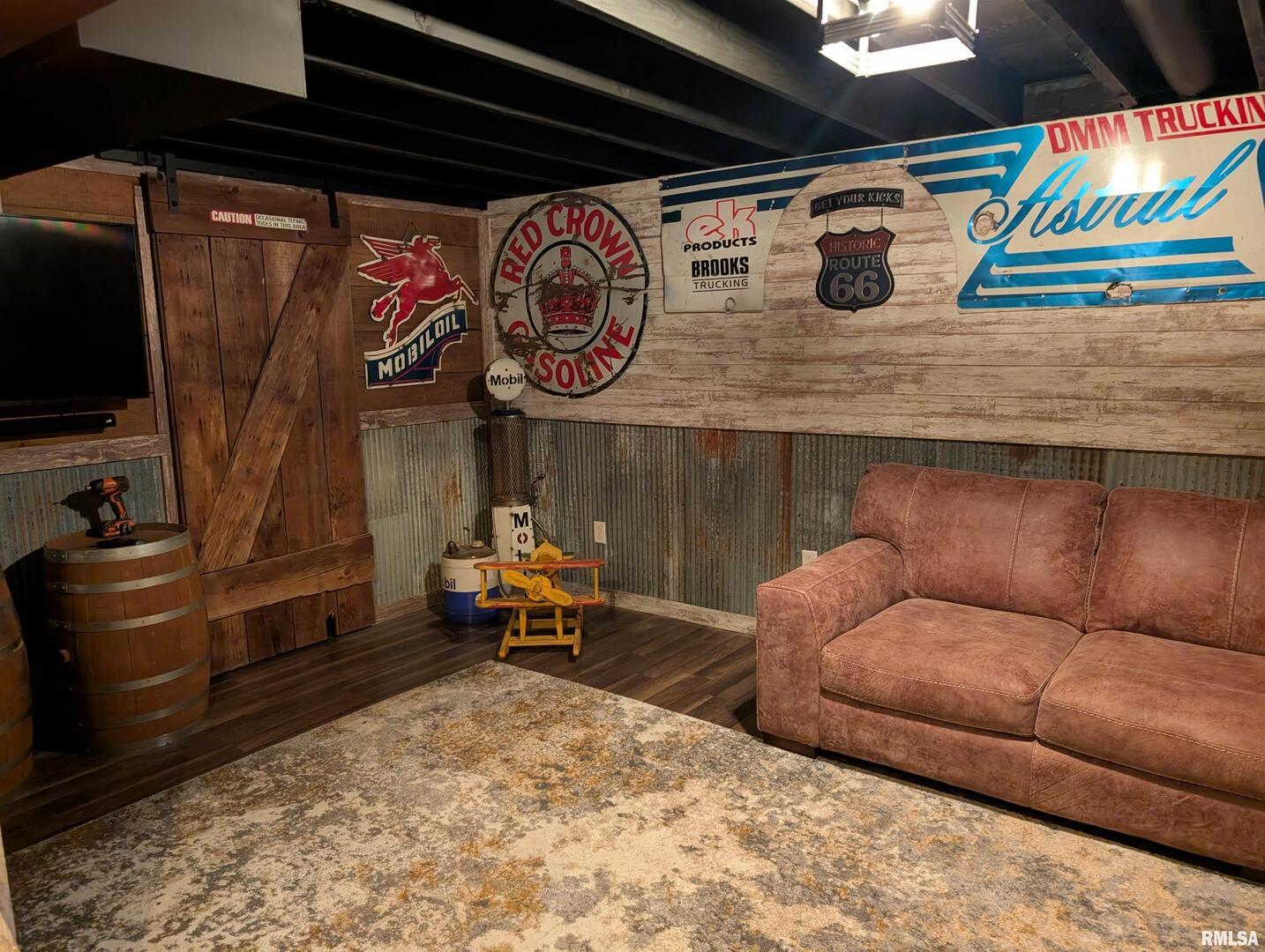 21 Manor Drive Park View, IA 52748 - Photo 7 of 9 a living room with furniture and a flat screen tv