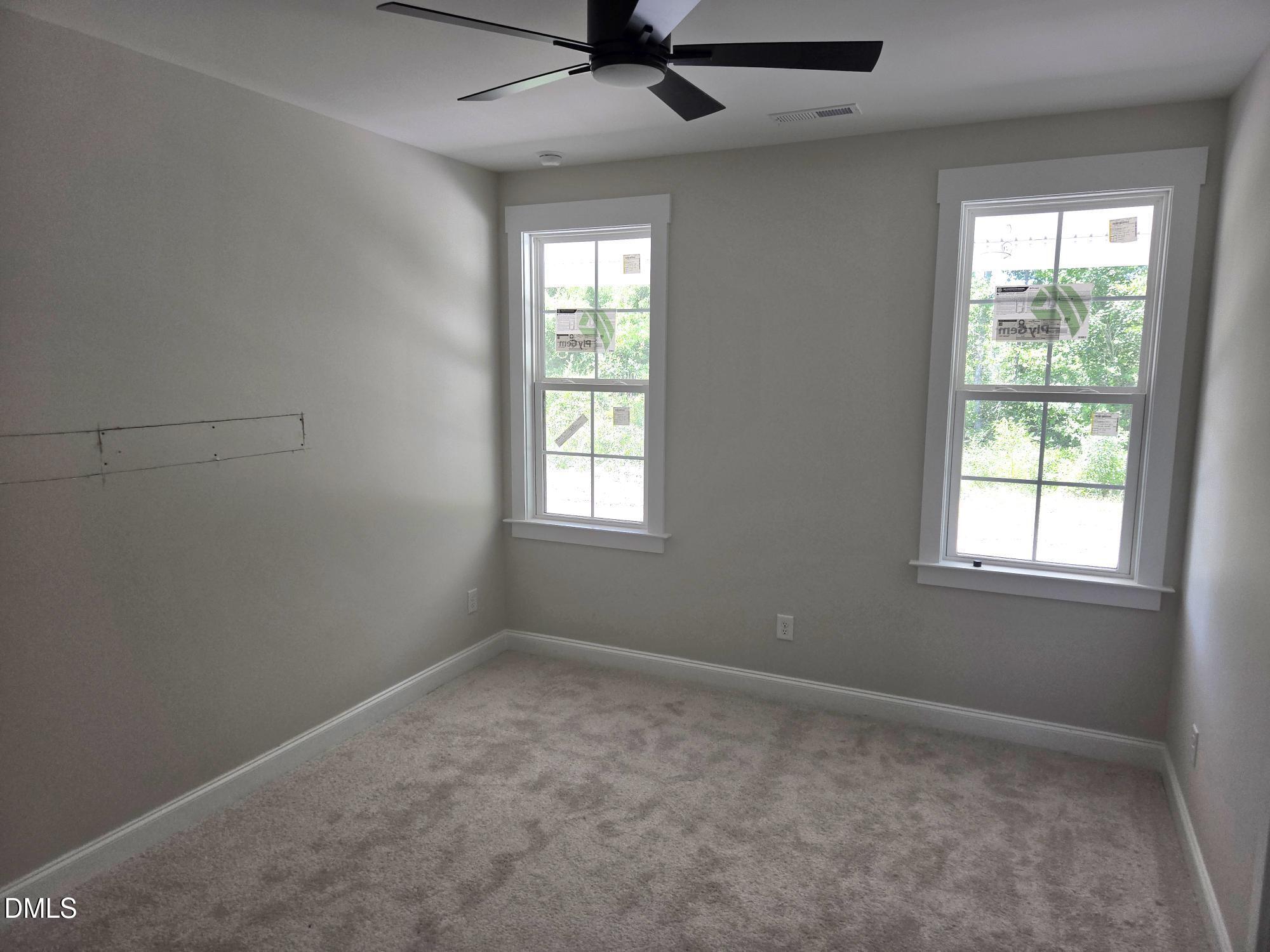 300 Avery Road Erwin, NC 28339 - Photo 17 of 38 an empty room with a window
